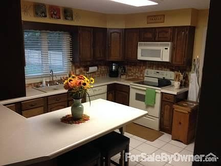 Master Bath
						:
						With jetted air-bubble tub