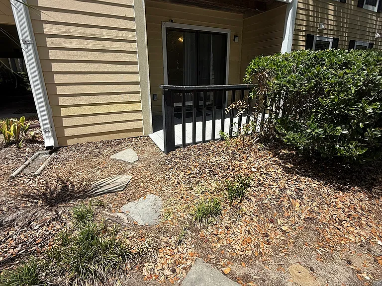 Stepping stones from reserved parking spot to Outdoor Deck