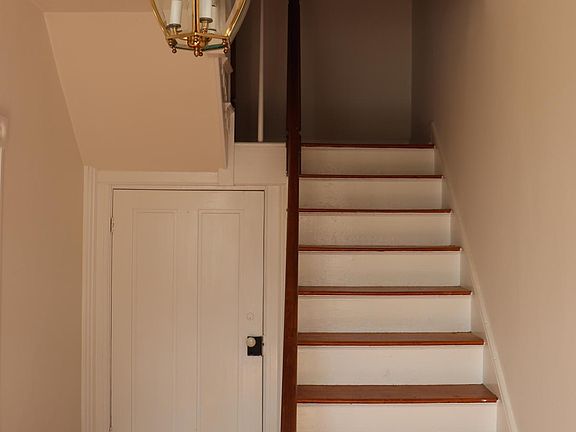 Front hall with coat closet