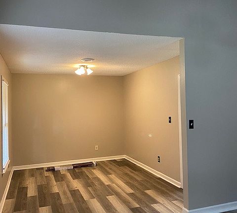 Dining room. Kitchen to right.