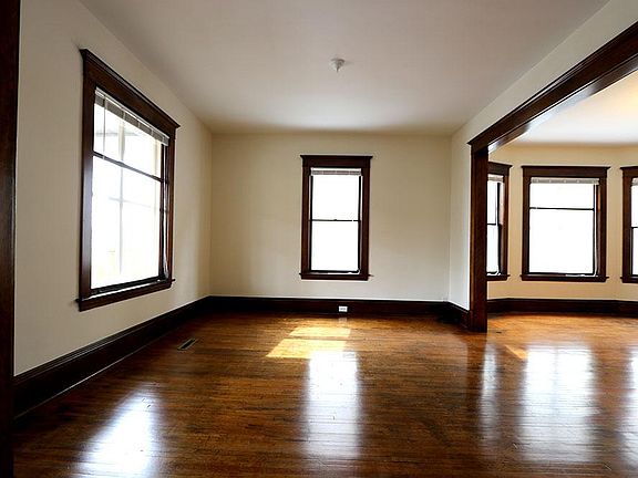 The huge living room opens to the dining room.