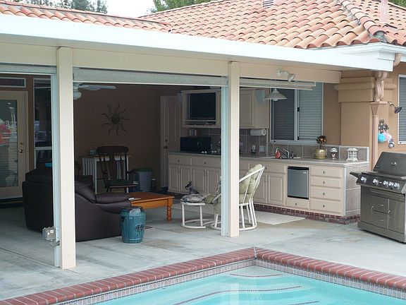 Poolside cook and entertainment center