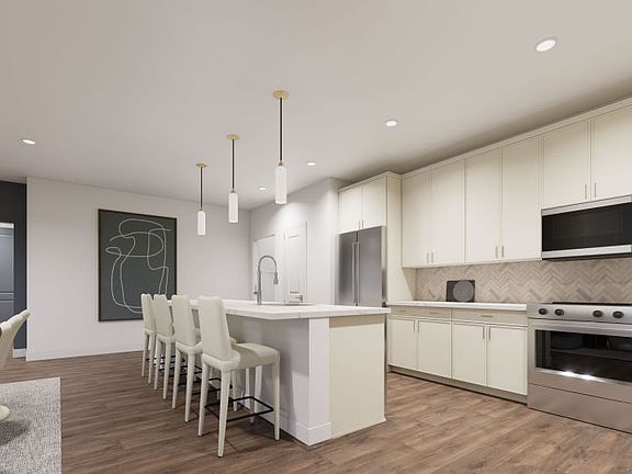 Kitchen with Expansive Island Seats 4 Comfortably