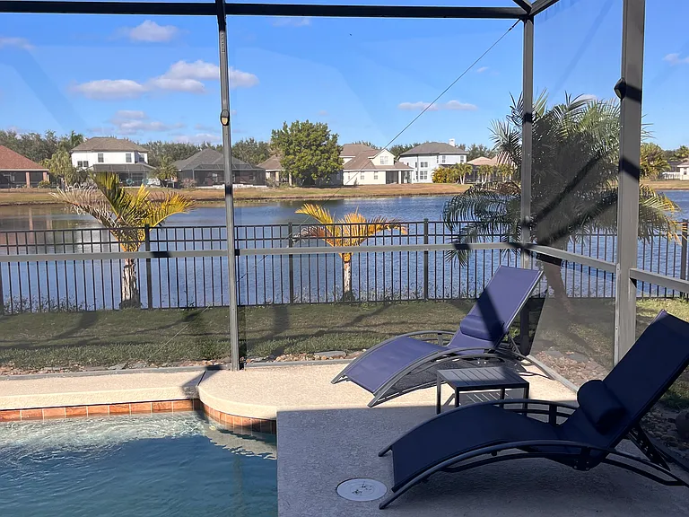 Sitting area next to pool