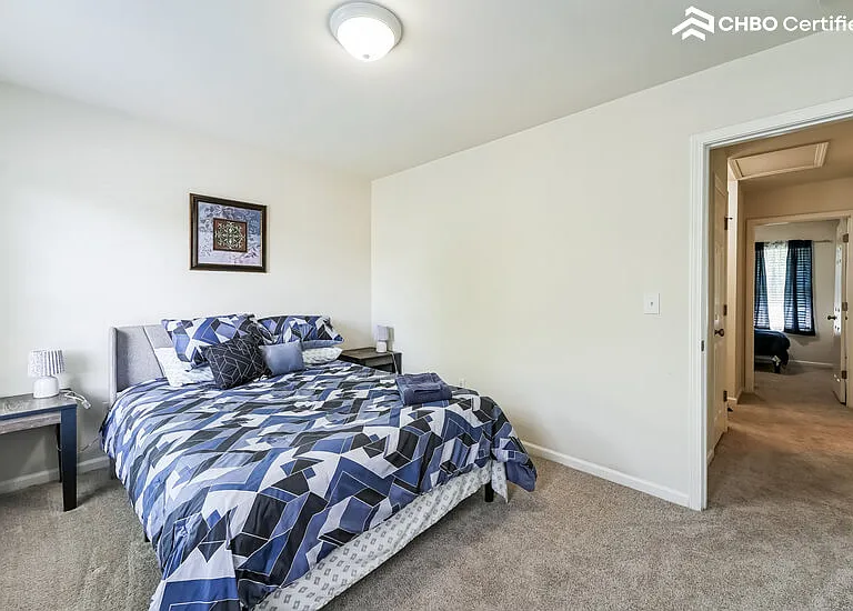 Secondary bedroom with queen bed,