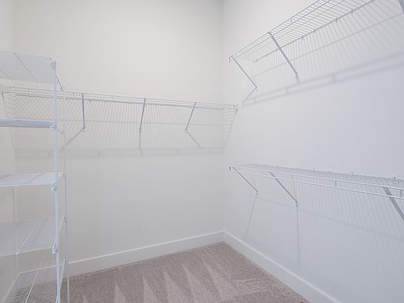 Primary suite walk-in closet