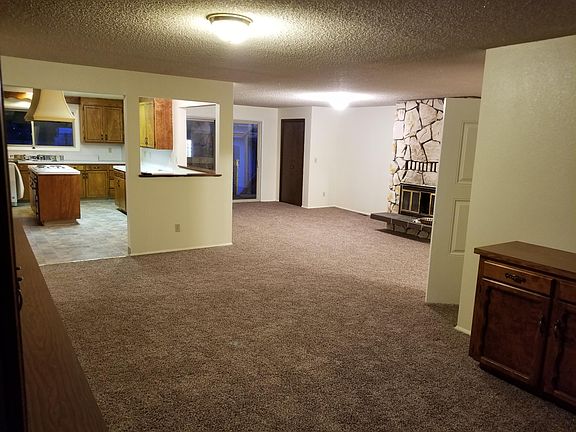 Looking toward living room & kitchen from formal dining room