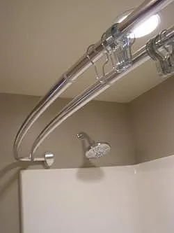 Bathroom double shower curtain rod.