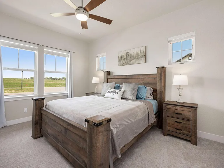 Master bedroom with comfy King bed, Smart TV, Ceiling fan, private patio with mountain views