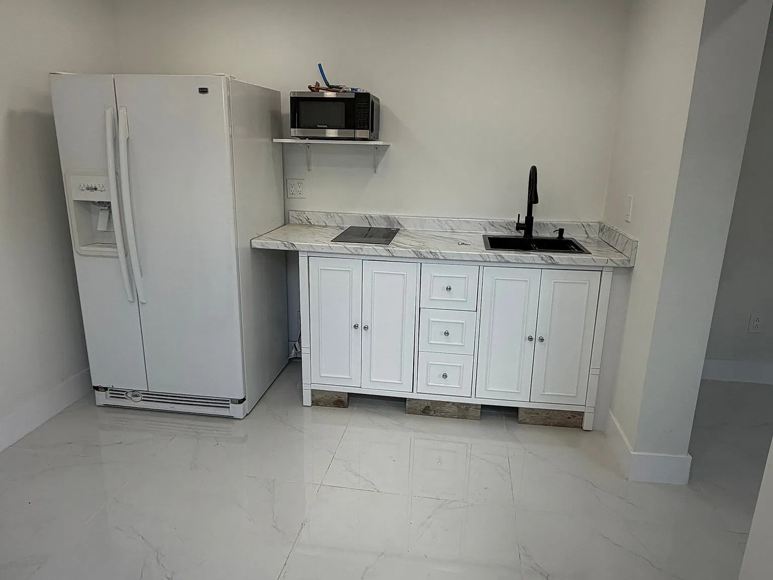 Enjoy this cozy and charming studio apartment, thoughtfully designed to offer comfort, convenience, — Photo 3