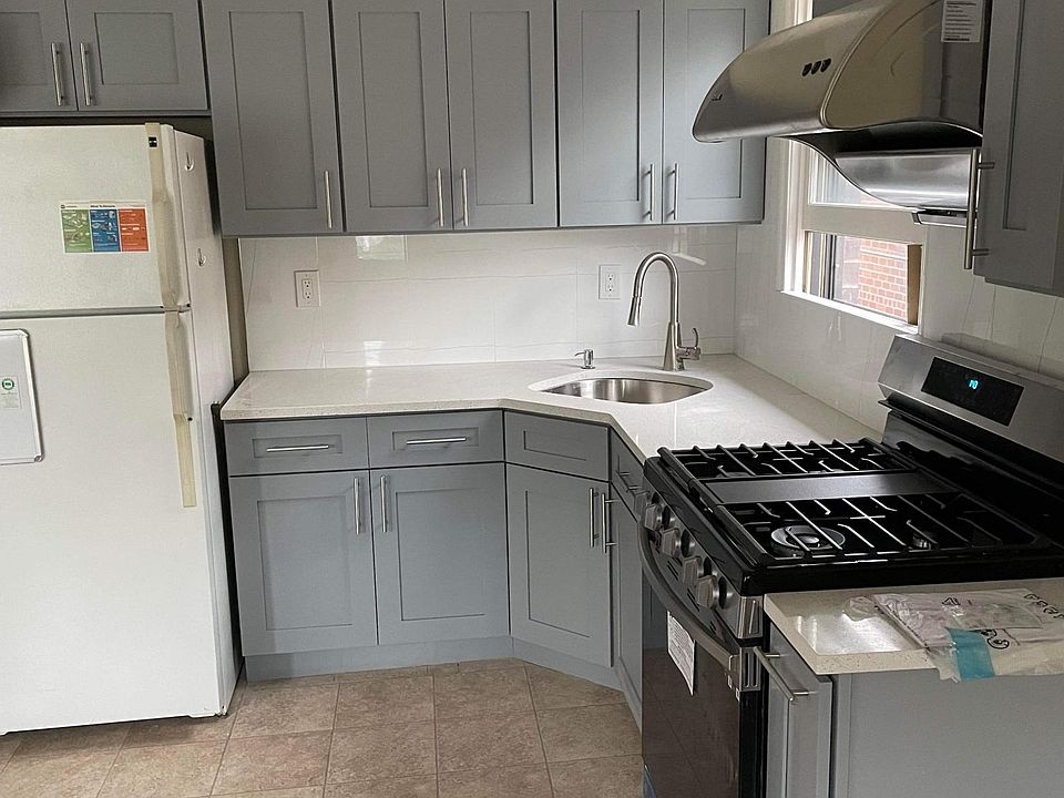 newly renovated kitchen with brand new stove and range