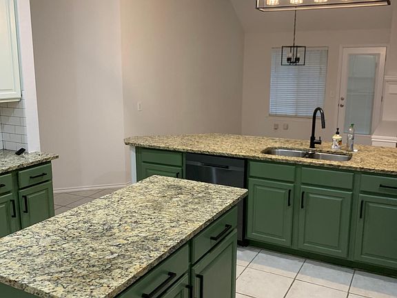 Kitchen and breakfast area in the back