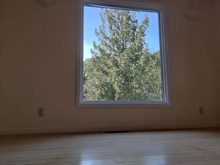 Upper floor living area view window (1 of 2)