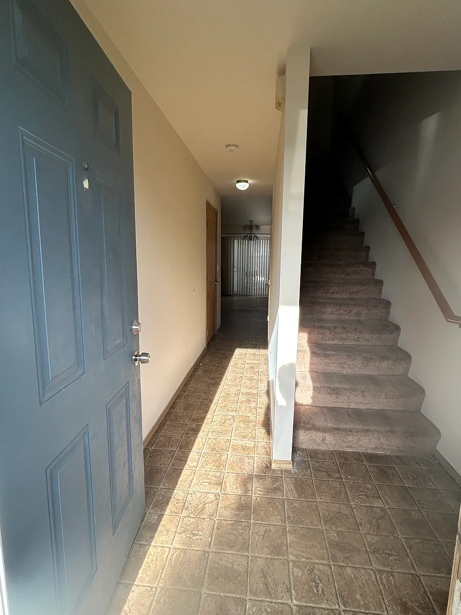Main Entrance-
-Right hall way to Living Room & Kitchen
- Stairs to Bedrooms and Bathrooms - 4546 S Puget Sound Ave #D