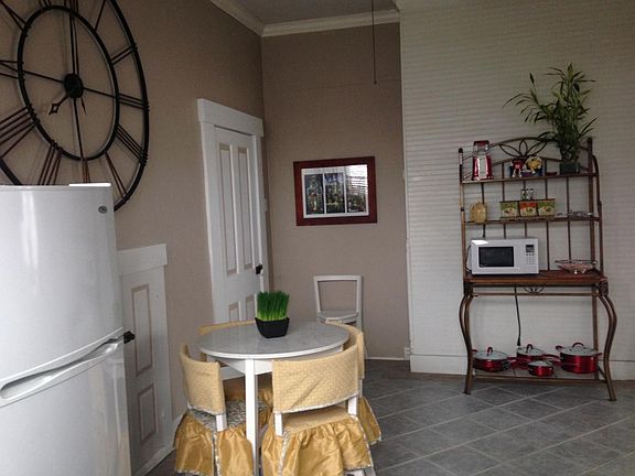 Kitchen dining area and baker's rack