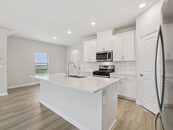 Kitchen in the Lewiston floorplan at a Meritage Homes community in Atlanta, GA.