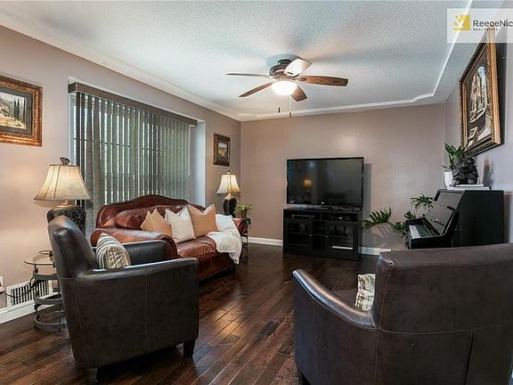Lovely living room with beautiful hand-scraped wood floors.