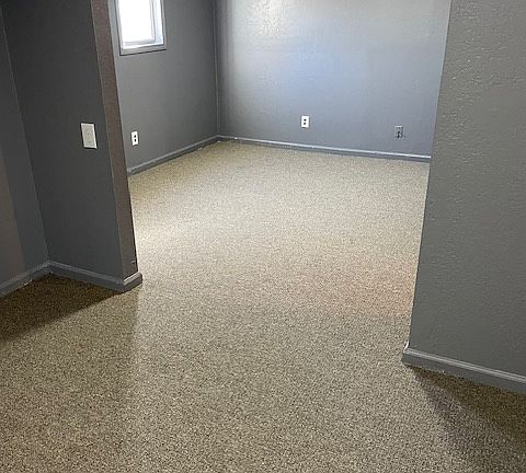 primary bedroom and sitting room