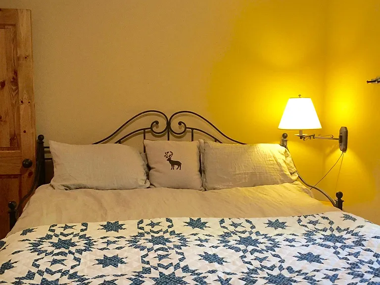 Bedroom 1 with trundle bed set-up as a king bed.