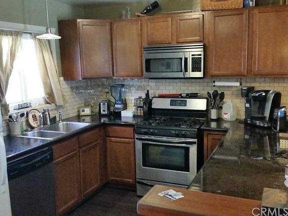 Kitchen with all the appliances and granite counter top.