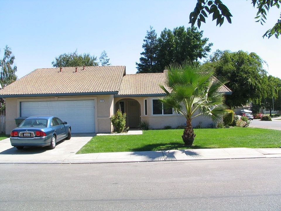 Front of house showing stucco.
