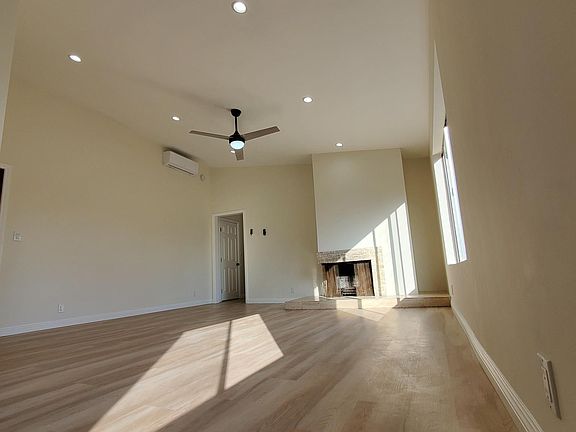 * Voluminous 12' Floor-to-Ceiling at the Peak
* Air Conditioner & Heater and Ceiling Fan
