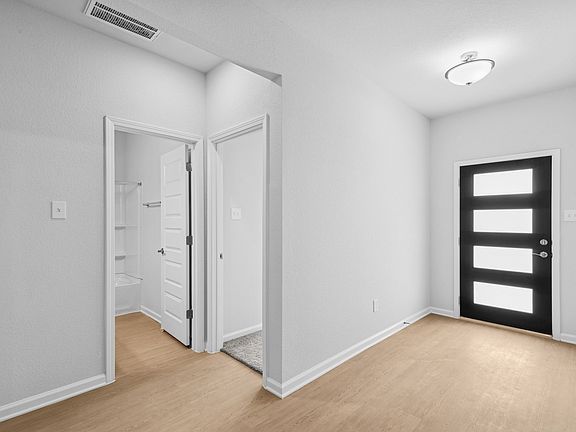 The Pearson- Foyer into Secondary Bath and Bedrooms