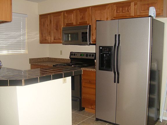 4th image of 9023 W Elm St Unit 4