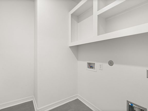 Utility room. Note Sample product photo - actual exterior and interior selections may vary by homes