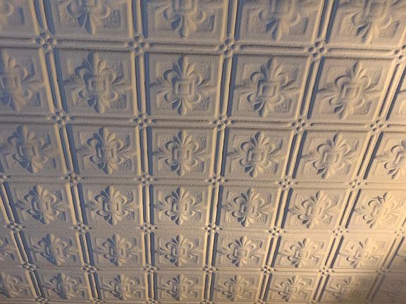 Living room ceiling original to the building.