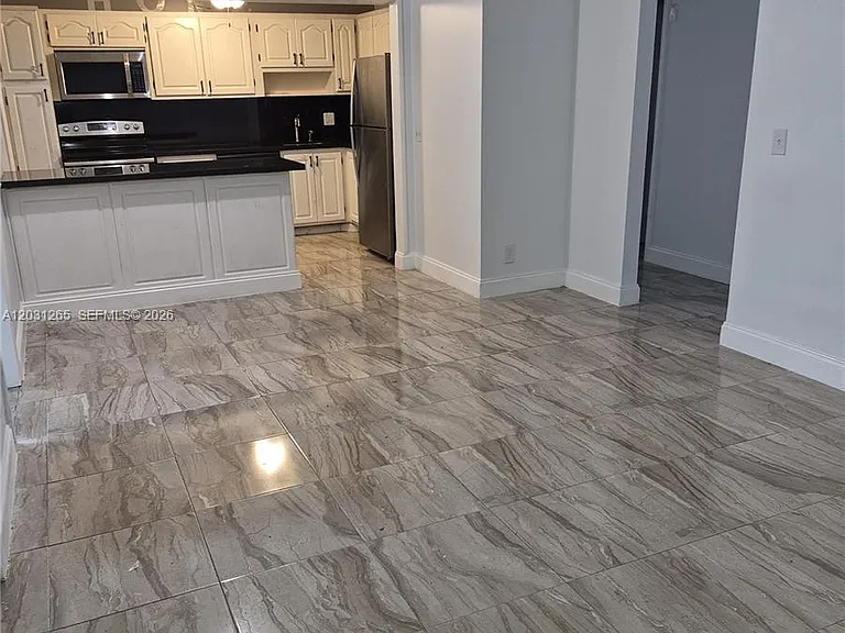 3035 NW 68th St #12D — Photo 3