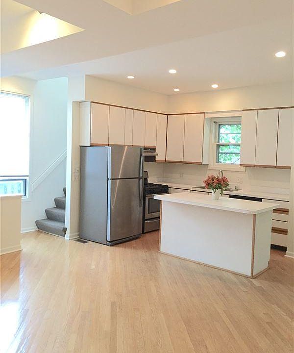 open concept main-floor with kitchen/living/dining space