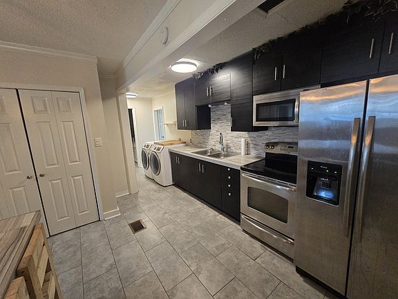 Kitchen with updated appliances and cabinets