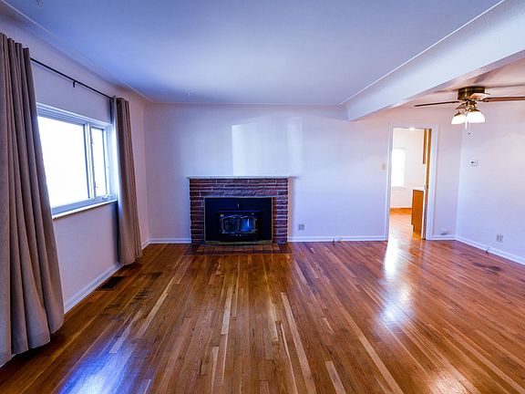 As you walk in from front door. Living room & Dinning room. View into kitchen as well.