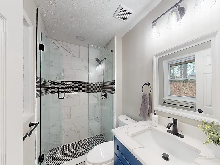 Luxury Bathroom with updated tiles and shower
