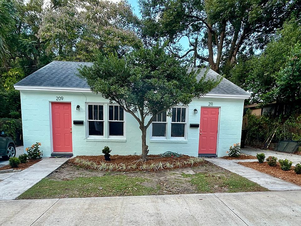 211 is the unit on the right. Includes driveway.