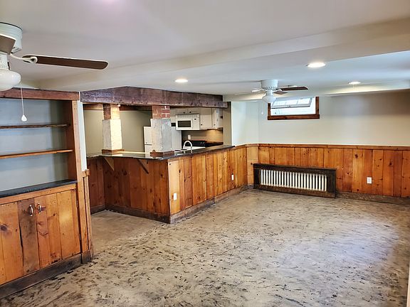 View of living room and kitchen from apt. entrance.