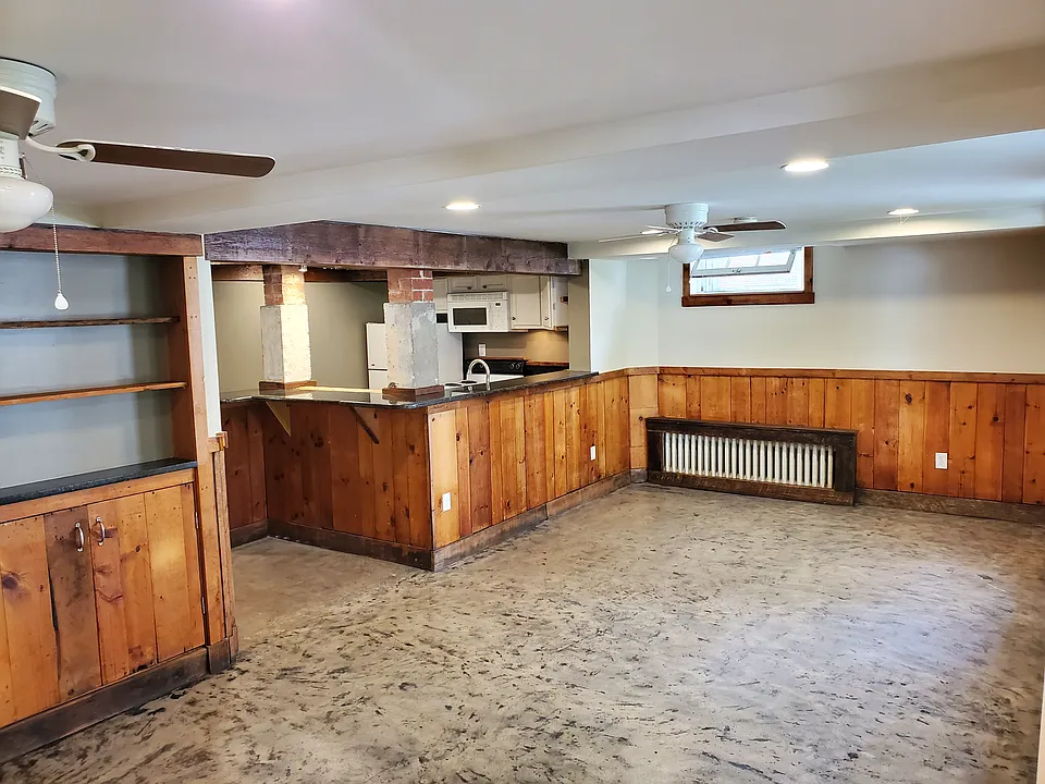 View of living room and kitchen from apt. entrance.