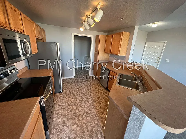 5705 N Genoa Way #208 — Photo 7