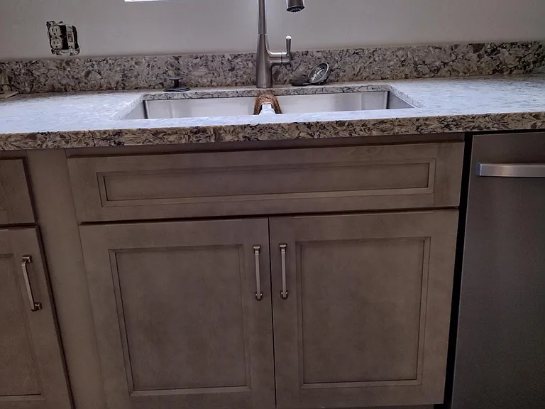 brand new kitchen appliances, including trash can for regular trash and recycle