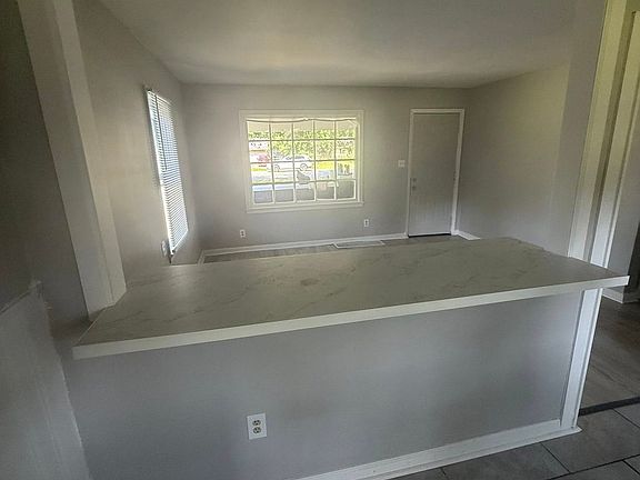 Newly added breakfast nook, the perfect place for family meals, game night, or seasonal decor.