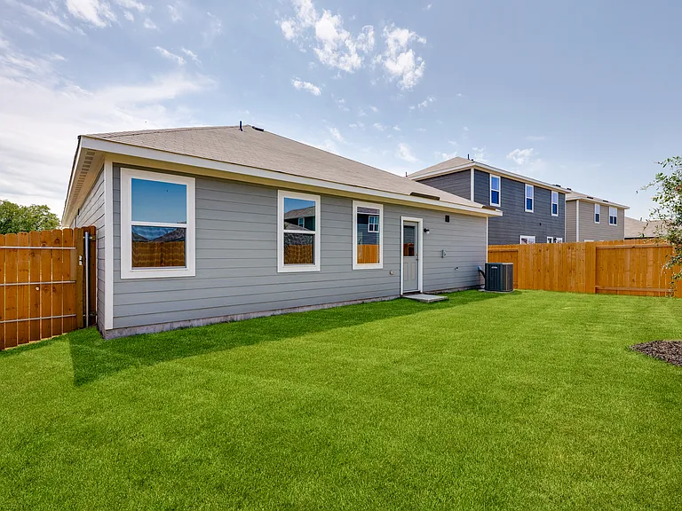 The back yard of the Reed is fully fenced-in.