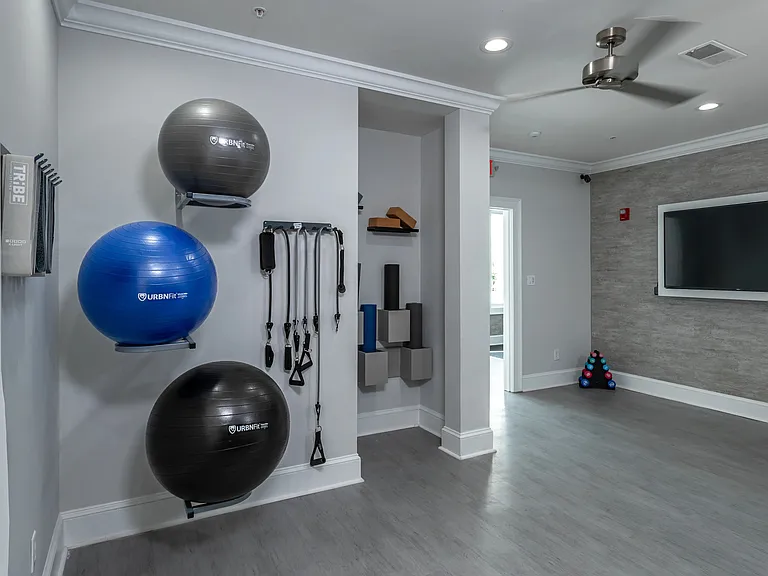 Unwind in our new yoga studio equipped with a variety of yoga and stretching gear.