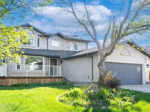 61 E Cimarron Way, Okotoks, AB T1S 1R7