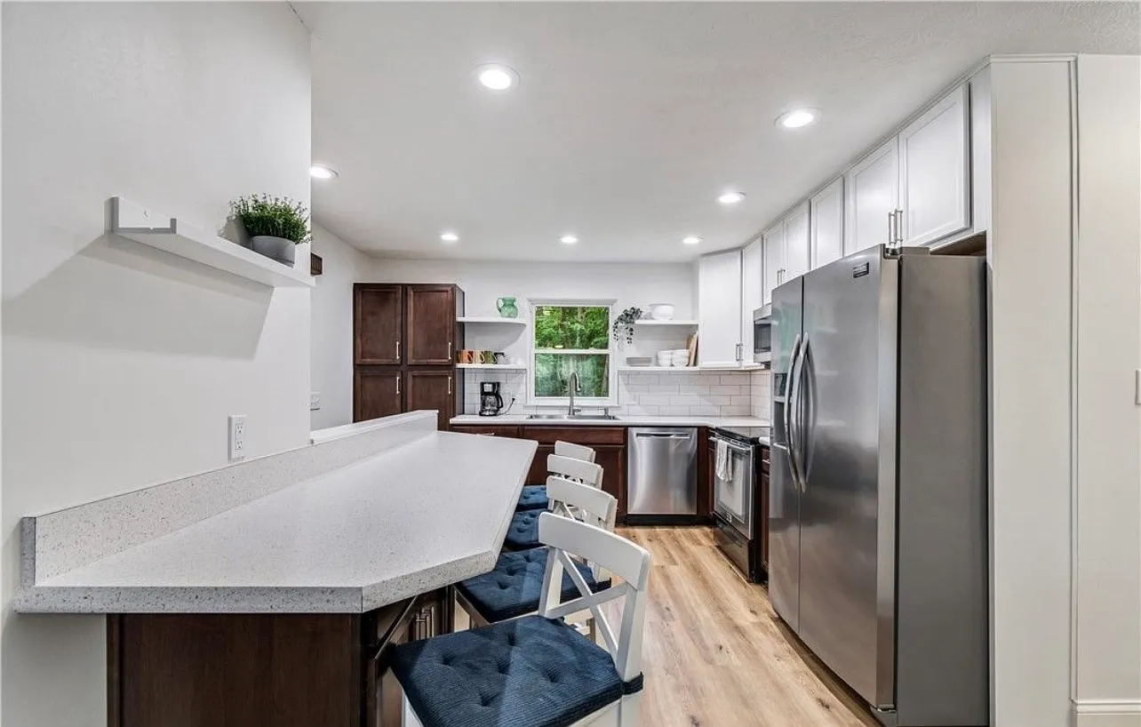 Updated 2BR Duplex with Garage, Rec Room & Balcony — Photo 2