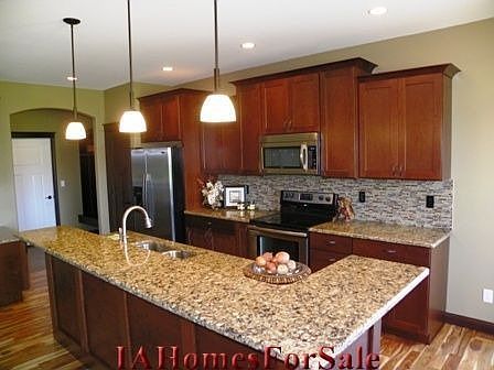 Kitchen - Cherry Cabinets With Quartz Countertops