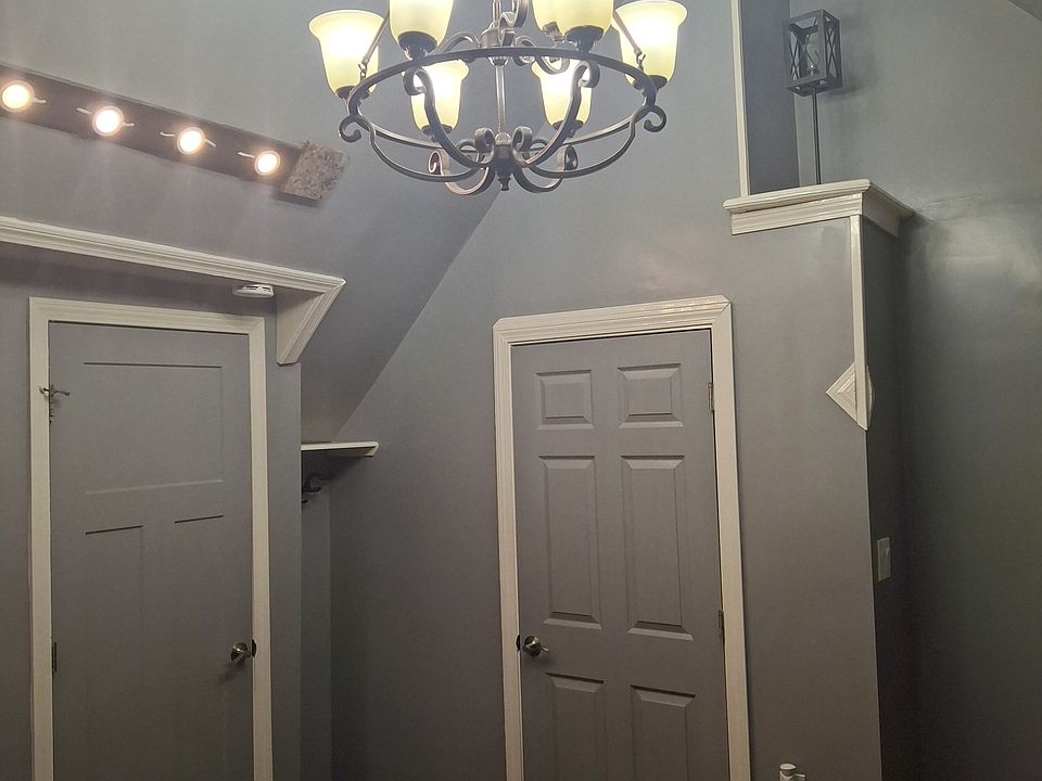 LR Chandlier 2 doors to bedrooms