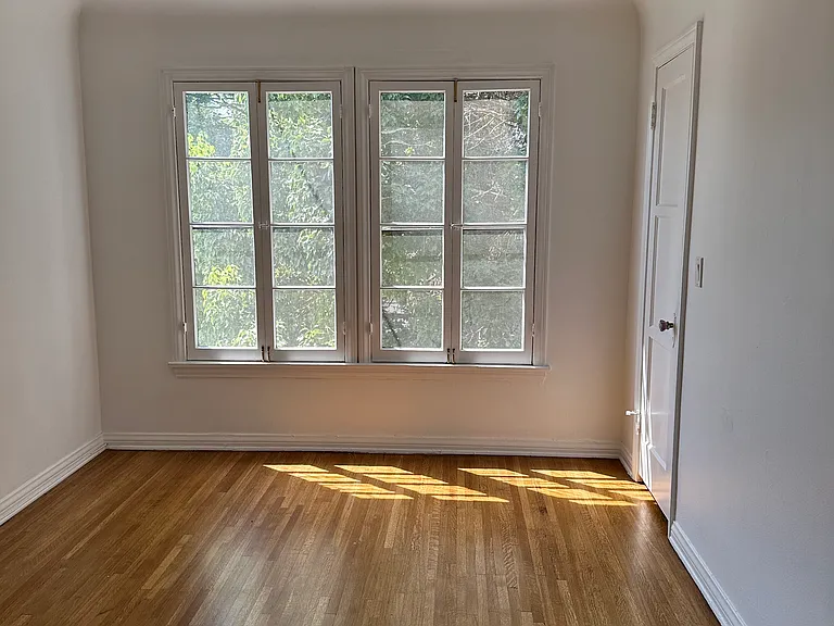 Bedroom #3, with two closets, one is a walk-in