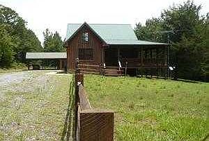 front drive at fence line