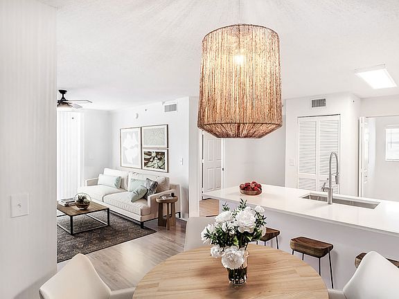 Kitchens are complete with an entertaining island and quartz countertops.